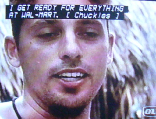 ‘Amazing Race’ episode showing pop-on caption from a commercial: I GET READY FOR EVERYTHING AT WAL-MART. [ Chuckles ]